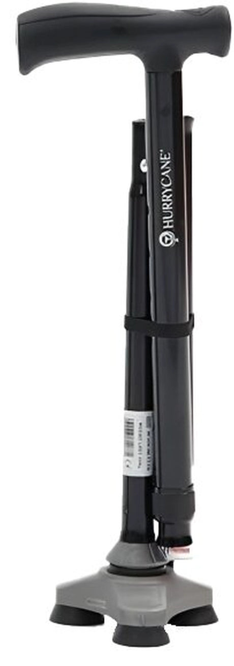 Faltbarer Gehstock Hurrycane in Schwarz mit ergonomischem Griff und rutschfestem Gummifuß, zusammengefaltet stehend.
