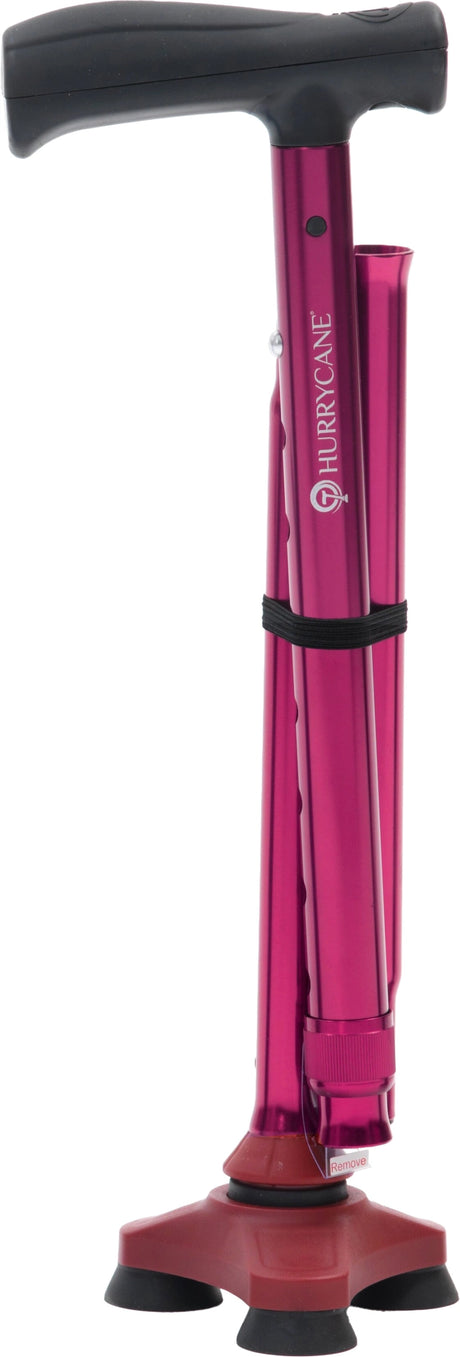 Zusammengefalteter roter Gehstock Hurrycane von Drive Medical mit ergonomischem Griff und rutschsicherem Standfuß – kompakt und standsicher.